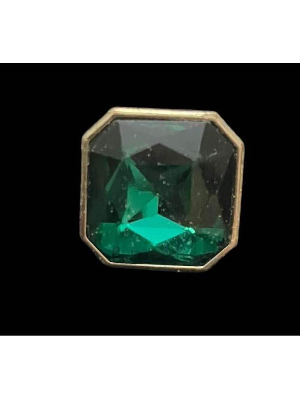 GLINDA. gold-toned emerald cut green stone ring